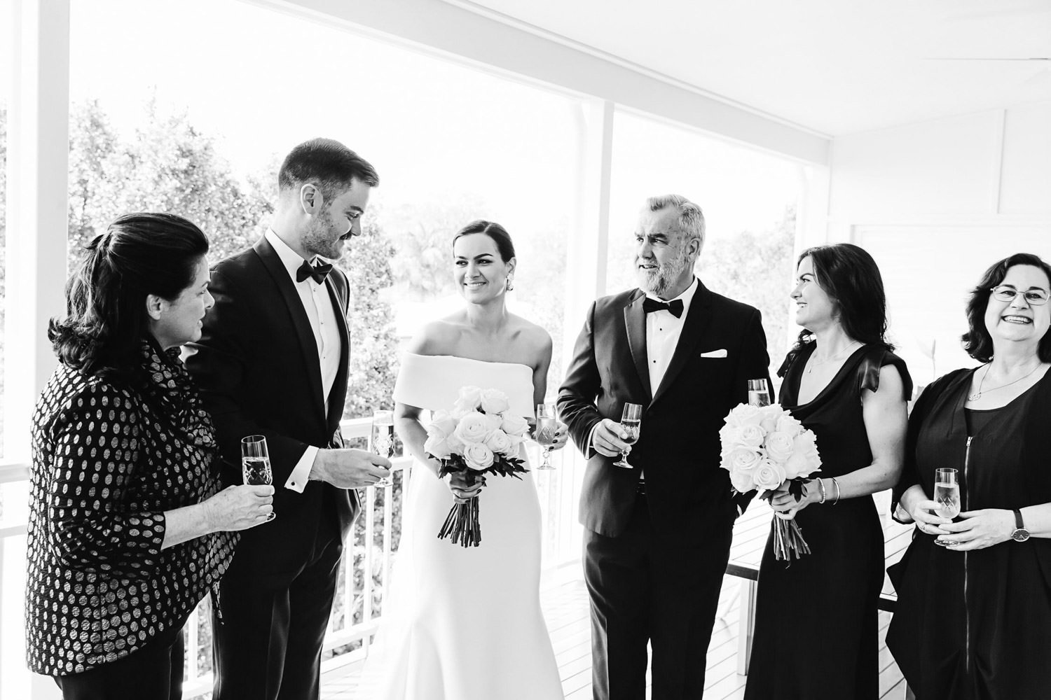family-celebrating-with-champagne-blacktie-tattersalls-wedding-quinceandmulberry