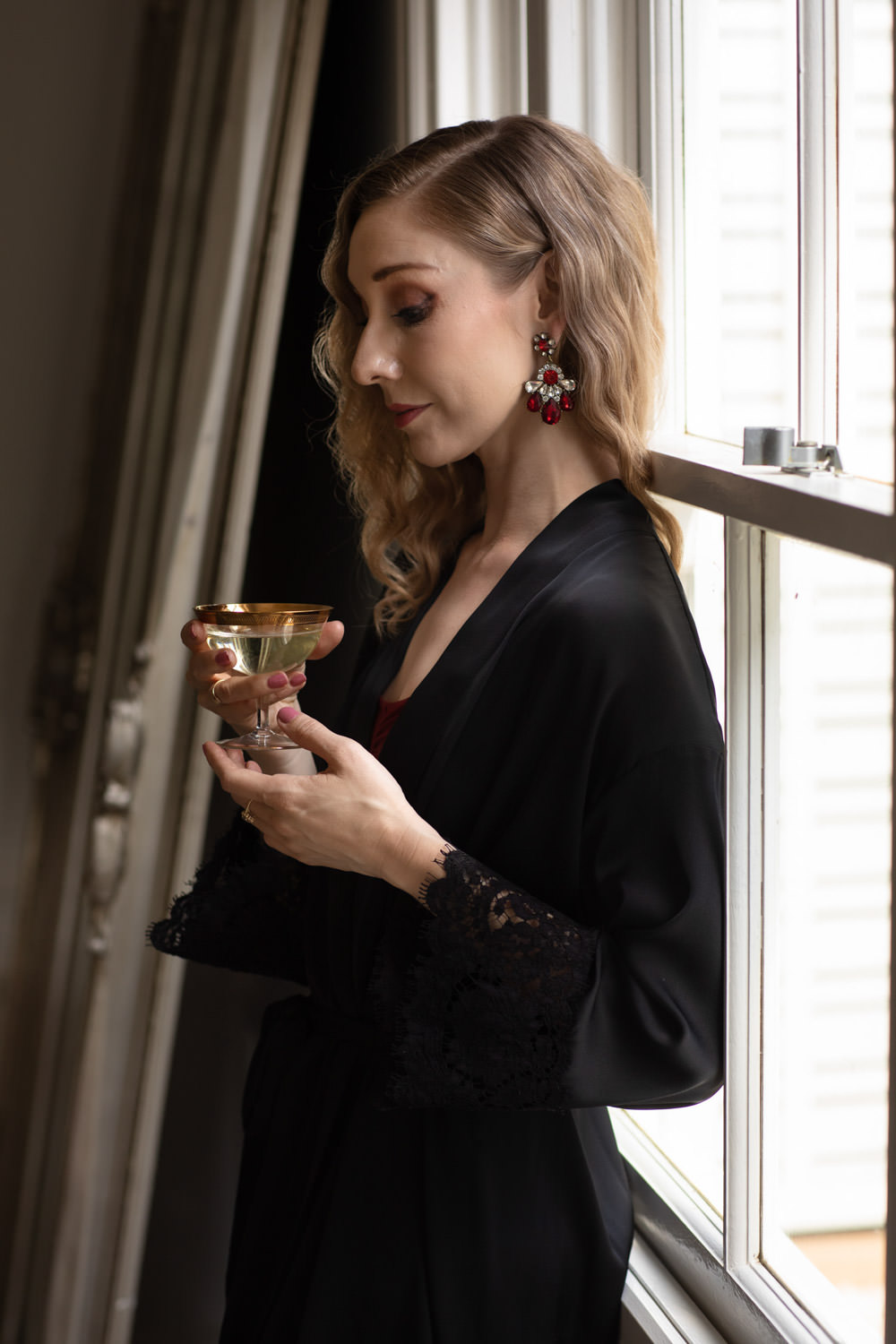 George-wu-robe-collection-launch-holding-champagne-thoughtful-small-business-photography-quinceandmulberrystudios