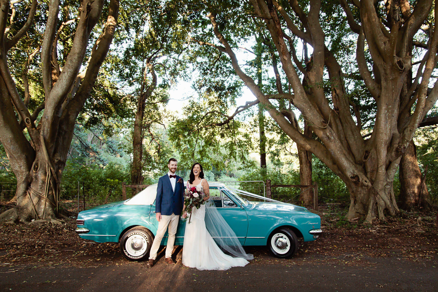 bride-and-groom-wedding-car_Ewingsdale-Hall_Byron_Bay-Wedding-QuincenmulberryStudios