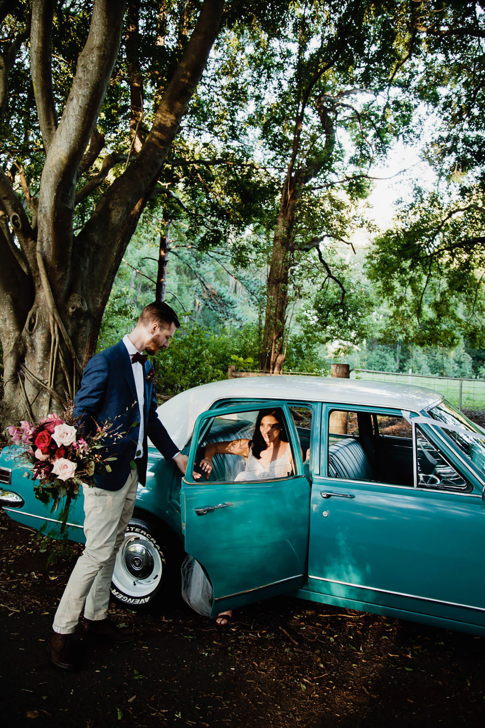 -wedding-car-getaway-Ewingsdale-hall-DIY-Wedding-ideas-natural, fun, romantic-wedding-photography-QuinceandMulberry
